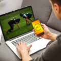 man-betting-on-football-from-his-mobile